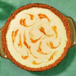 Triple Citrus Creamsicle Pie with swirl design and Biscoff cookie crust
