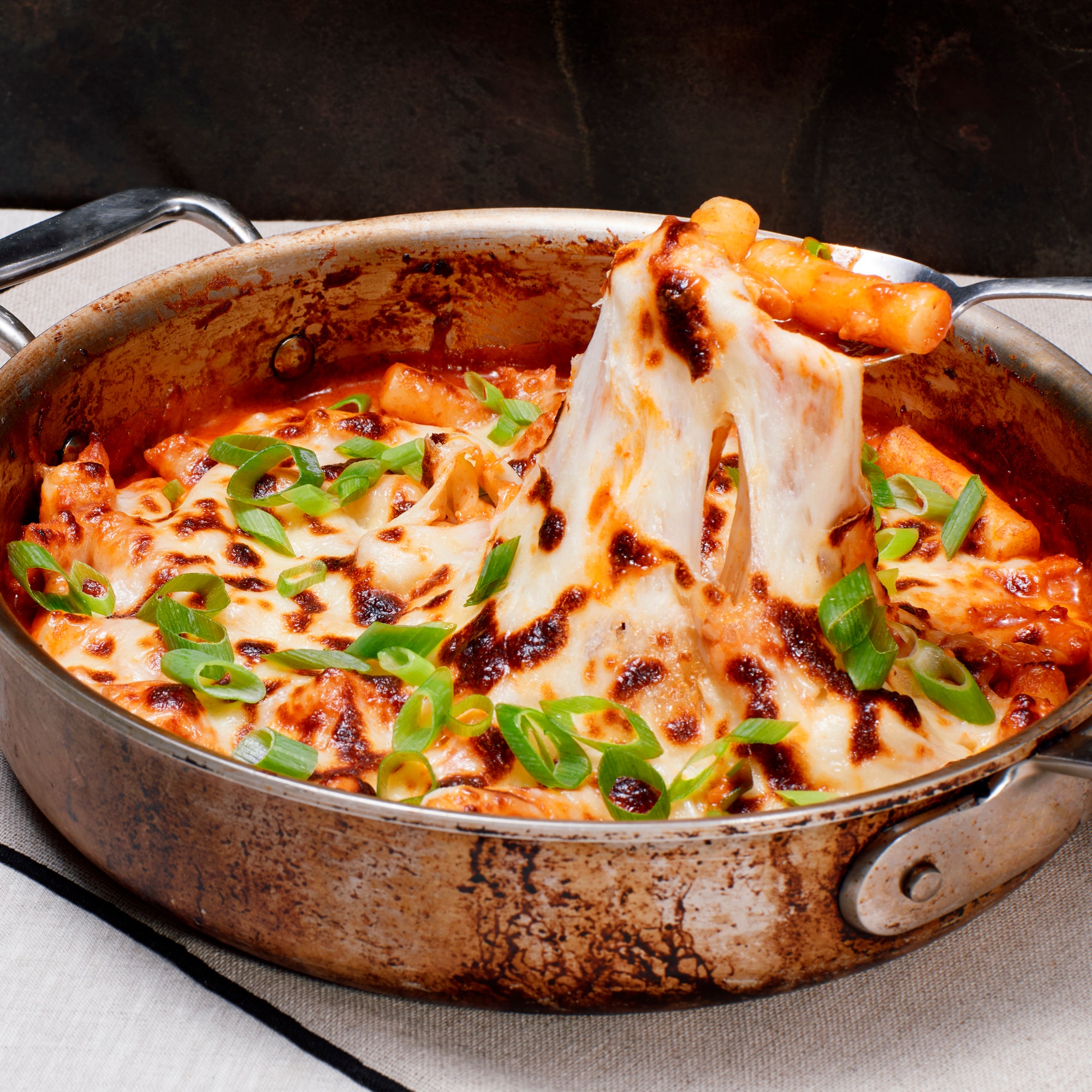 Image may contain Food Meal Cup Food Presentation Dish Cooking Pot Cookware Pot Plate Pizza and Stew
