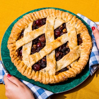 A lattice topped pie filled with mincemeat a combination of spiced boozesoaked fruit and nuts.
